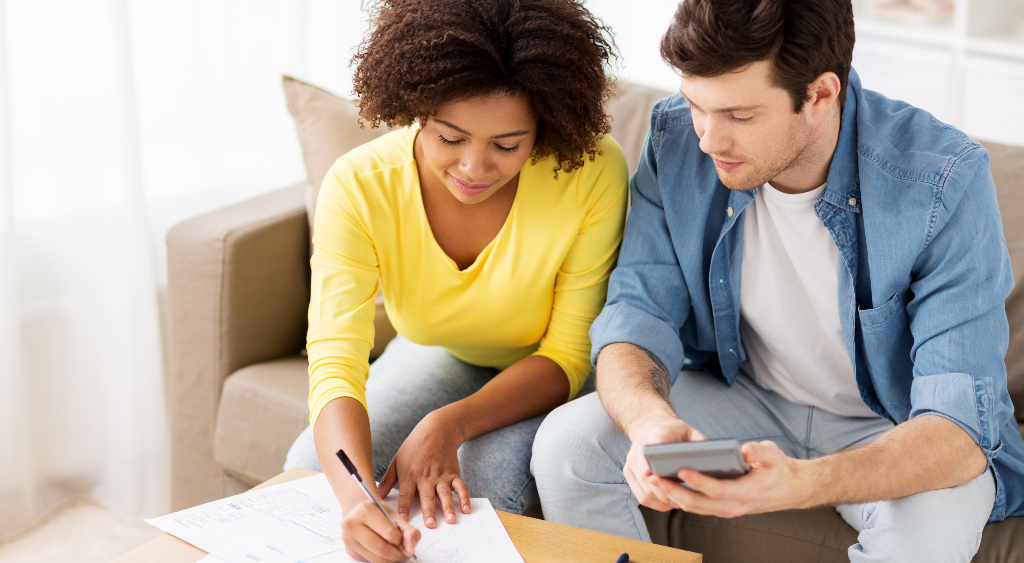 couple budgeting and making a financial plan for their family