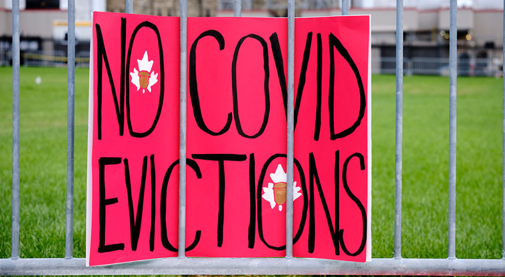 covid rent protest sign