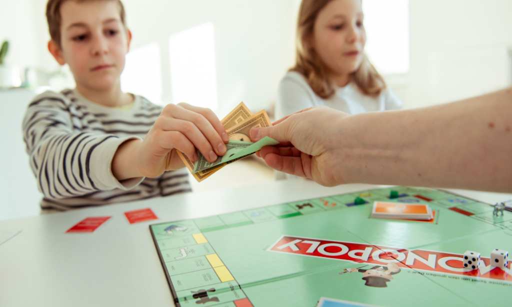 Playing money games like Monopoly can teach kids about money.